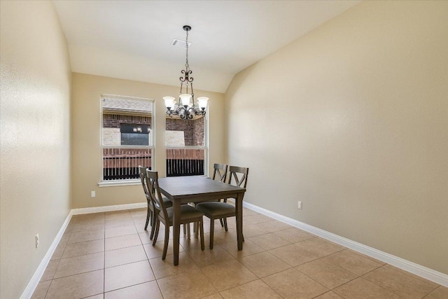 2944 Saint Federico Way, Round Rock, TX 78665 - dining space featuring a chandelier, vaulted ceiling, and light tile patterned floors