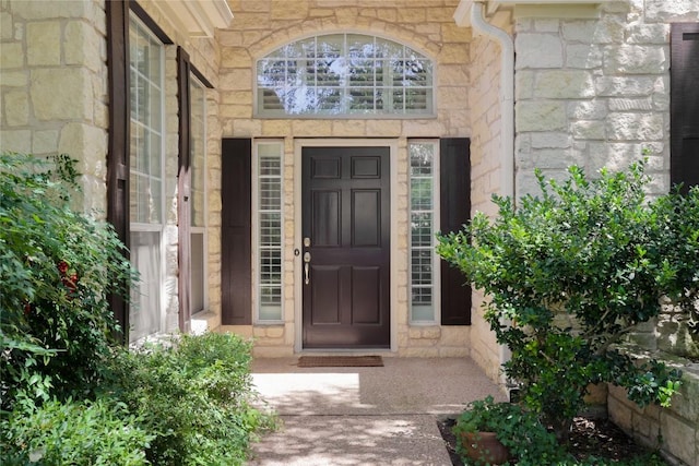4101 Triple Crown Ct, Austin, TX 78746 - doorway to property with stone siding