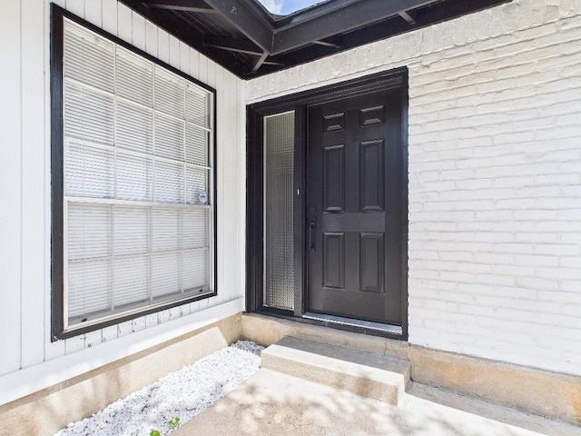 6108 Shadow Valley Dr Unit A, Austin, TX 78731 - doorway to property with brick siding