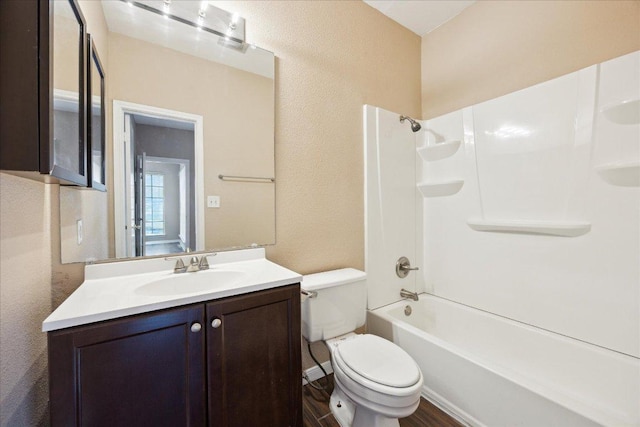 712 W 21st St Unit 202, Austin, TX 78705 - bathroom with a textured wall, vanity, tub / shower combination, and wood finished floors