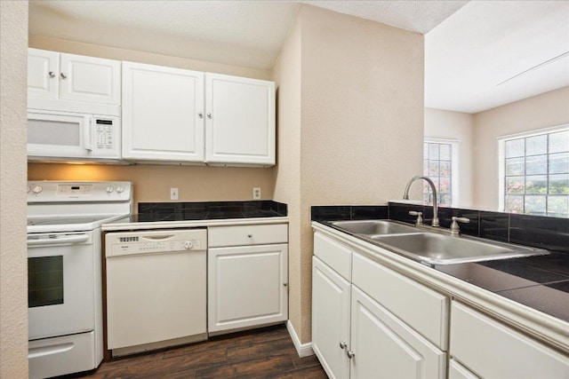 712 W 21st St Unit 202, Austin, TX 78705 - kitchen featuring white appliances, dark wood-style floors, and white cabinets