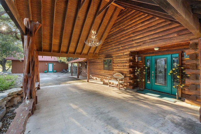 101 Rolling Hills Rd, Blanco, TX 78606 - doorway to property with log exterior