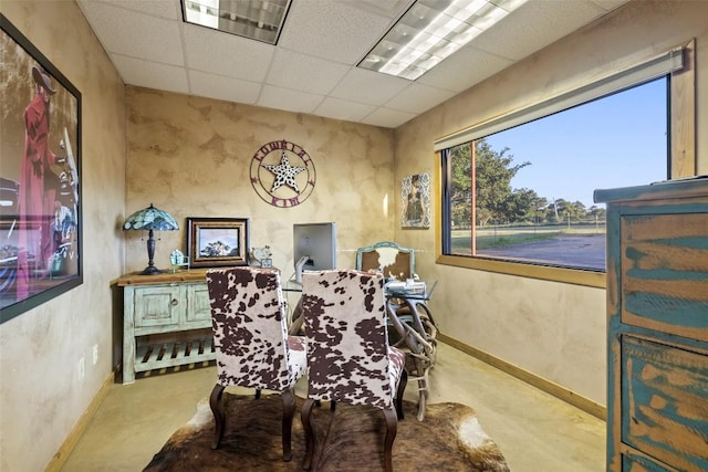 101 Rolling Hills Rd, Blanco, TX 78606 - dining space featuring a paneled ceiling and baseboards