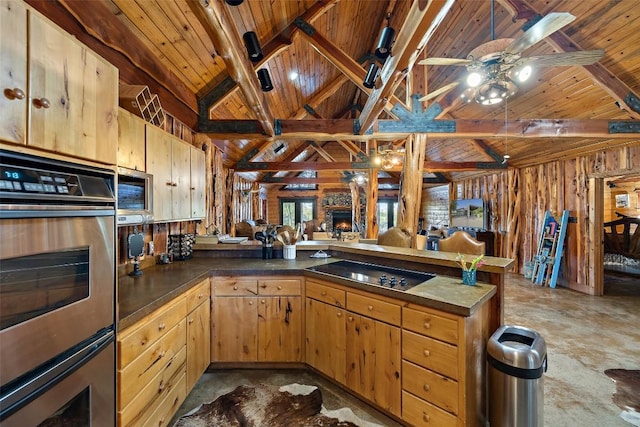 101 Rolling Hills Rd, Blanco, TX 78606 - kitchen with wood ceiling, a peninsula, wooden walls, black electric stovetop, and dark countertops