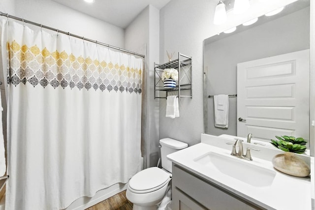 5512 Baythorne Dr, Austin, TX 78747 - full bathroom with vanity, shower / bath combo, and wood finished floors