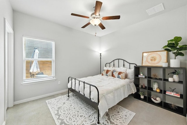 5512 Baythorne Dr, Austin, TX 78747 - carpeted bedroom with multiple windows and a ceiling fan