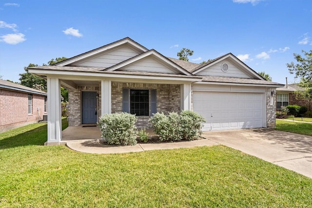 2010 Hawksbury Way, Cedar Park, TX 78613 - single story home featuring an attached garage, driveway, brick siding, a front lawn, and covered porch