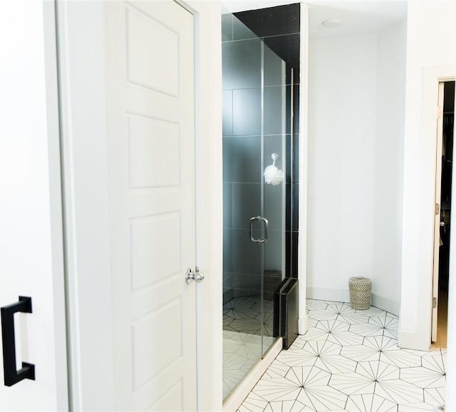 1510 Homespun Rd Unit 79, Austin, TX 78745 - bathroom featuring a shower stall and tile patterned flooring