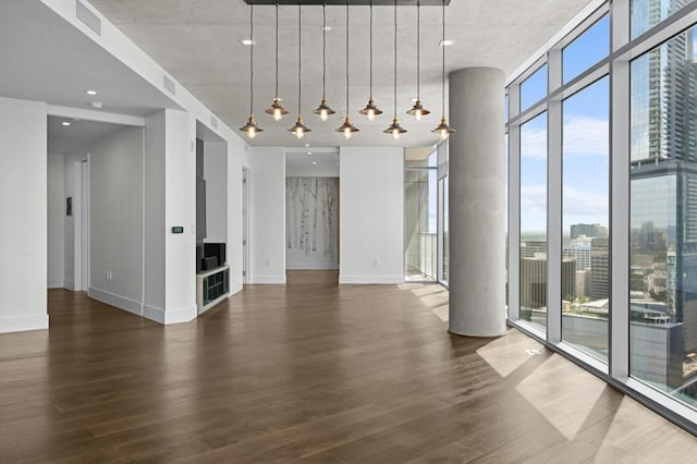 501 W Ave Unit 3201, Austin, TX 78701 - unfurnished room with floor to ceiling windows and wood finished floors