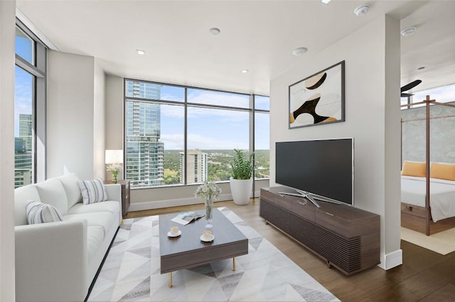 501 W Ave Unit 3201, Austin, TX 78701 - living area with wood finished floors and ceiling fan