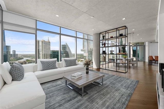 501 W Ave Unit 3201, Austin, TX 78701 - living room with wood finished floors, a city view, healthy amount of natural light, and a wall of windows