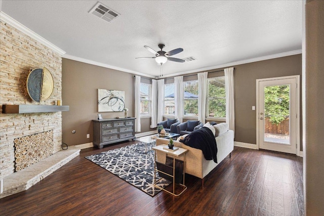 9520 Sydney Marilyn Ln, Austin, TX 78748 - living room with ornamental molding, wood-type flooring, ceiling fan, healthy amount of natural light, and a textured ceiling