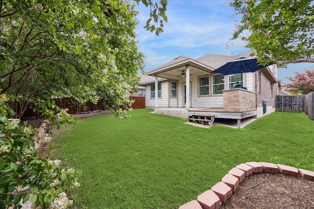 9520 Sydney Marilyn Ln, Austin, TX 78748 - rear view of house with ceiling fan, a fenced backyard, a deck, and a shingled roof