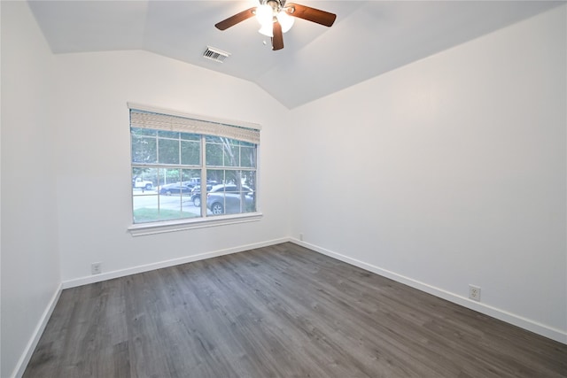 910 Rocking Spur Cv, Pflugerville, TX 78660 - spare room with lofted ceiling, a ceiling fan, and dark wood-style flooring
