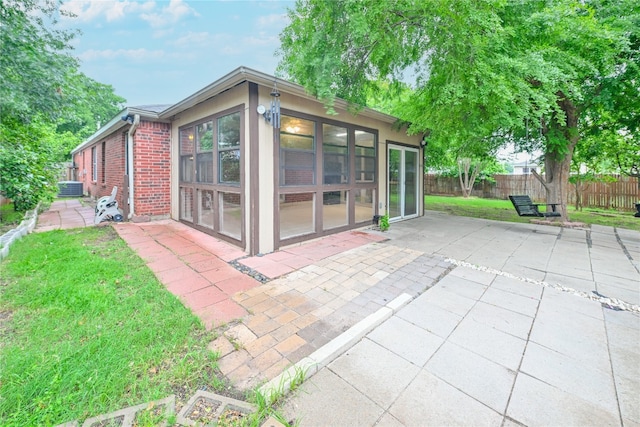 910 Rocking Spur Cv, Pflugerville, TX 78660 - view of patio with a sunroom