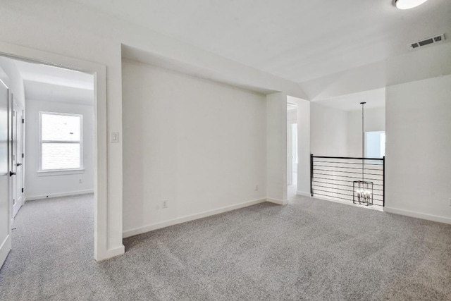 596 Biscayne Bay Bnd, Kyle, TX 78640 - spare room featuring carpet and baseboards