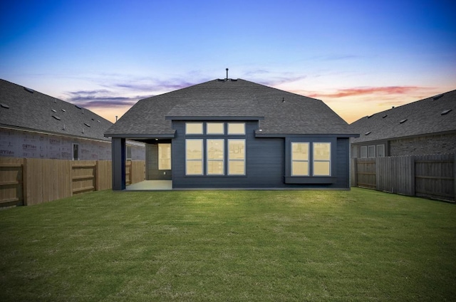 596 Biscayne Bay Bnd, Kyle, TX 78640 - back of house with a shingled roof, a fenced backyard, and a patio area
