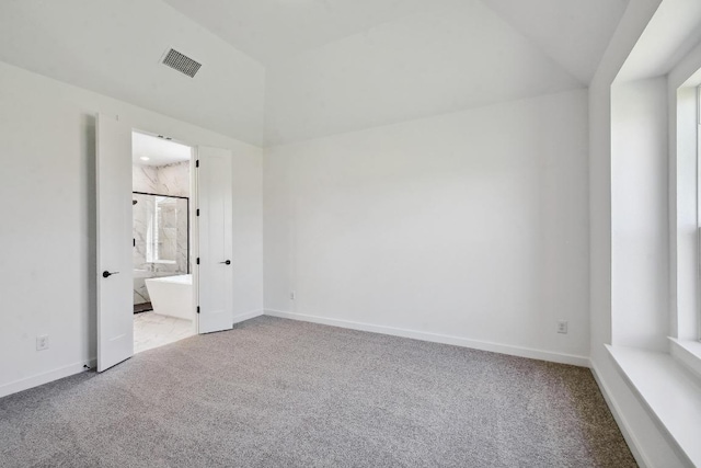 596 Biscayne Bay Bnd, Kyle, TX 78640 - unfurnished bedroom featuring carpet floors and ensuite bathroom