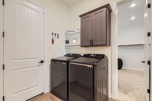 1505 Sibley Way, Leander, TX 78641 - washroom featuring washing machine and clothes dryer, cabinet space, and recessed lighting