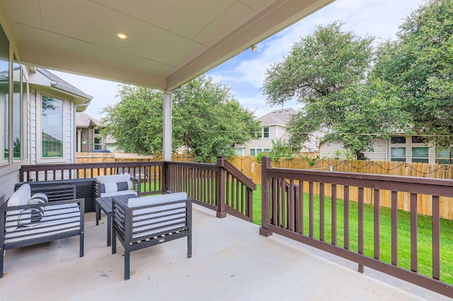 1505 Sibley Way, Leander, TX 78641 - fenced backyard with an outdoor hangout area, a patio, and a residential view