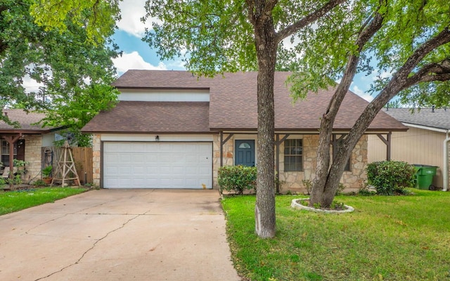 1623 Peachtree Valley Dr, Round Rock, TX 78681 - view of front of property with stone siding, an attached garage, a shingled roof, and concrete driveway
