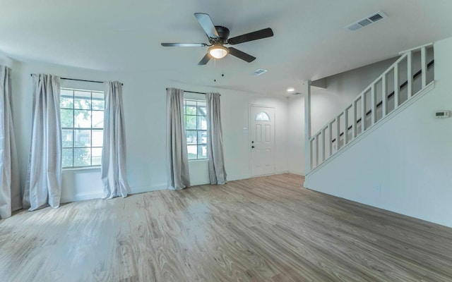1623 Peachtree Valley Dr, Round Rock, TX 78681 - foyer entrance featuring wood finished floors, a ceiling fan, and stairway