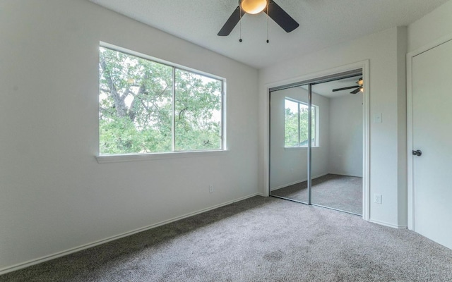 1623 Peachtree Valley Dr, Round Rock, TX 78681 - unfurnished bedroom featuring carpet, ceiling fan, and a closet