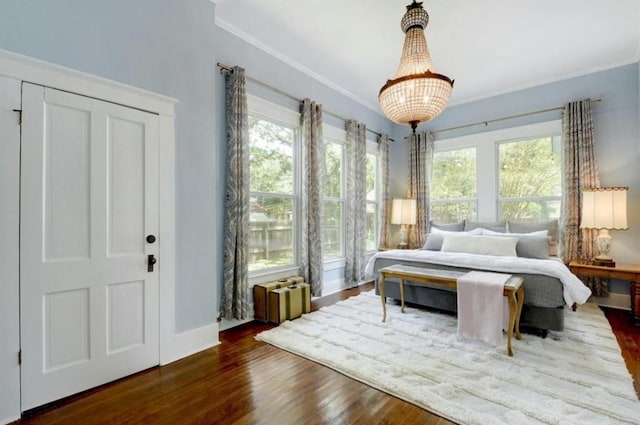 200 Garwood St, Smithville, TX 78957 - bedroom featuring ornamental molding and wood finished floors