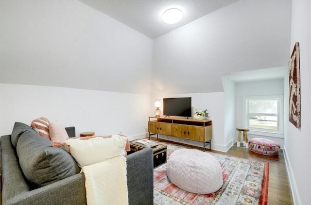 200 Garwood St, Smithville, TX 78957 - living room with lofted ceiling and wood finished floors