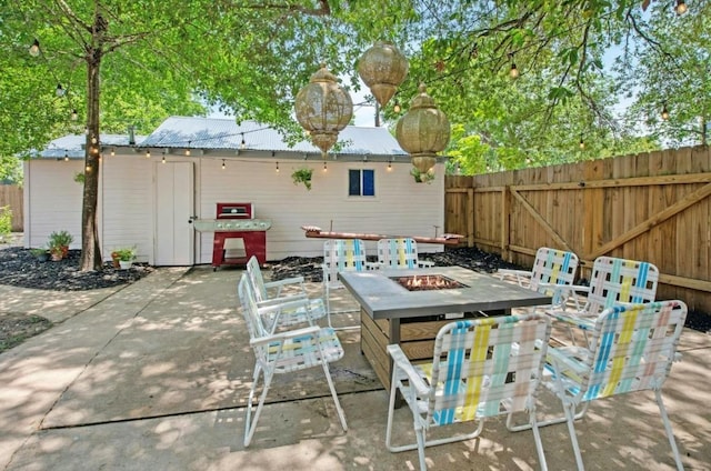 200 Garwood St, Smithville, TX 78957 - view of patio with a fire pit
