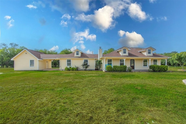 14596 Touchstone Rd Unit 3, Atascosa, TX 78002 - view of front facade with a front lawn, a chimney, and an attached carport
