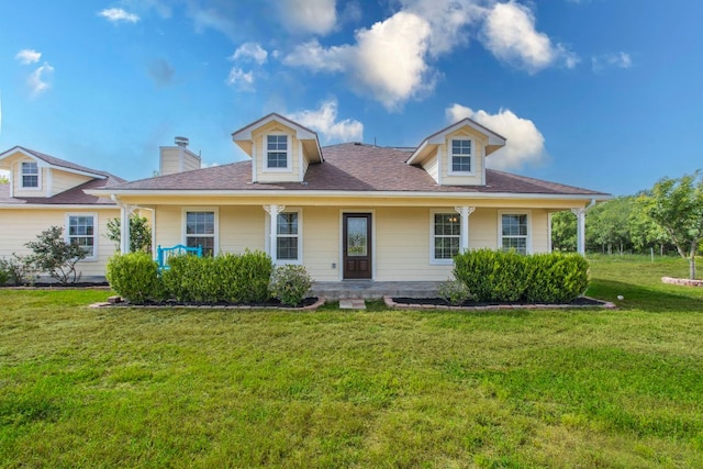 14596 Touchstone Rd Unit 3, Atascosa, TX 78002 - view of front of house with a front yard, covered porch, and a chimney