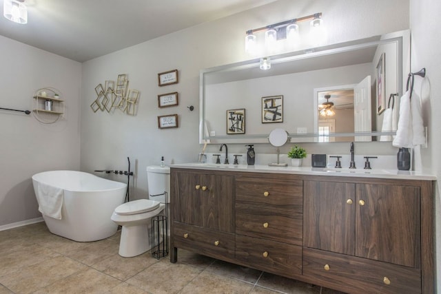 14596 Touchstone Rd Unit 3, Atascosa, TX 78002 - full bath with double vanity, a soaking tub, and tile patterned flooring
