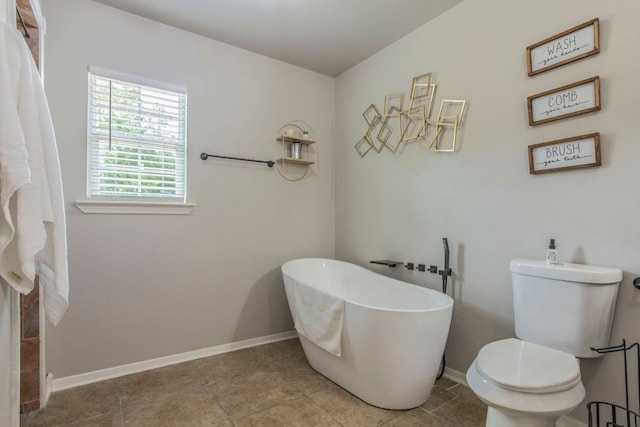 14596 Touchstone Rd Unit 3, Atascosa, TX 78002 - full bathroom featuring a freestanding tub and tile patterned flooring