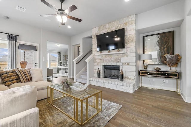113 Charro Ct, Georgetown, TX 78633 - living area with ceiling fan, wood finished floors, a fireplace, recessed lighting, and stairs