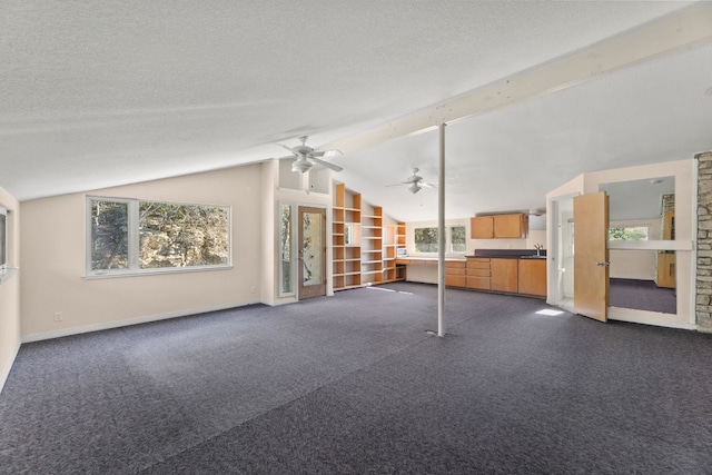 3309 Westhill Unit A & B, Austin, TX 78704 - unfurnished living room with dark carpet and ceiling fan