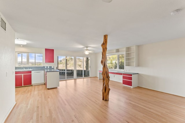 3309 Westhill Unit A & B, Austin, TX 78704 - unfurnished living room featuring light wood-style flooring, a ceiling fan, and healthy amount of natural light