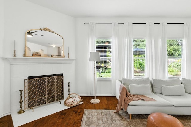 2108 Charlotte Estates Dr, Austin, TX 78744 - living area with wood finished floors and a tiled fireplace