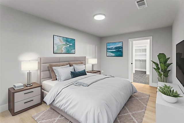 3907 Carmel Dr, Austin, TX 78721 - bedroom featuring light wood finished floors and baseboards
