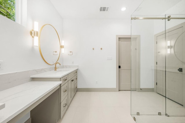 271 S College St, La Grange, TX 78945 - full bath featuring vanity, a shower stall, tile patterned flooring, and recessed lighting