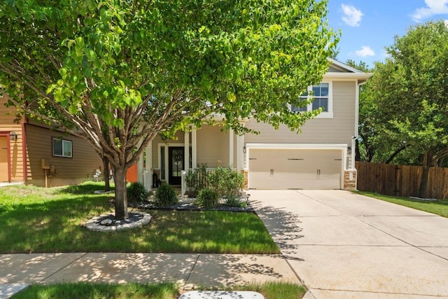 1620 Rockland Dr Unit 167, Austin, TX 78748 - obstructed view of property with concrete driveway, a garage, and stone siding