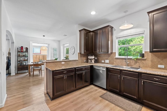 1620 Rockland Dr Unit 167, Austin, TX 78748 - kitchen with dishwasher, plenty of natural light, a peninsula, dark brown cabinets, and recessed lighting