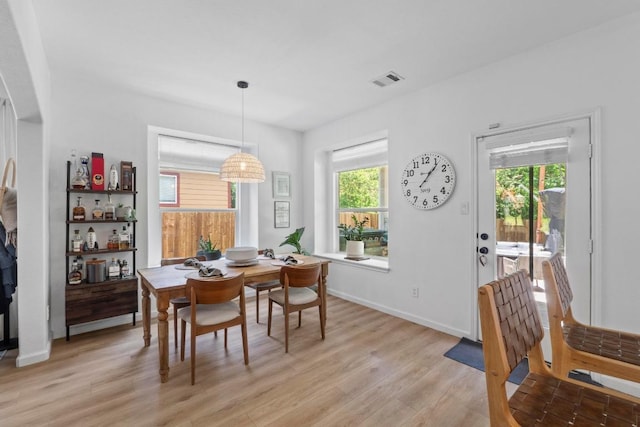 1620 Rockland Dr Unit 167, Austin, TX 78748 - dining area with light wood-style floors and baseboards