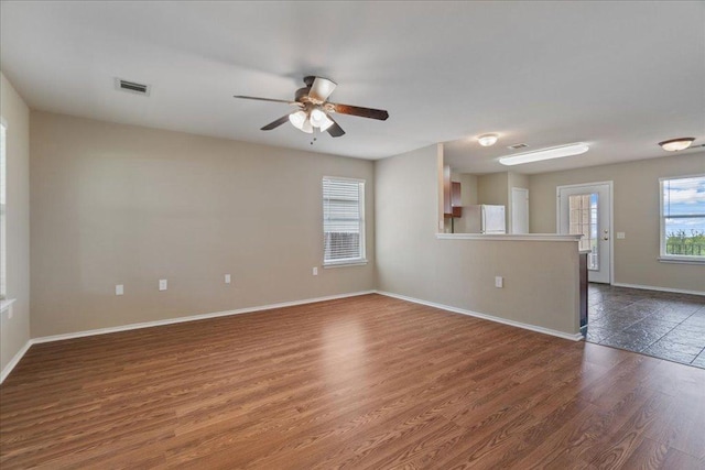 11617 Briarcreek Loop, Manor, TX 78653 - unfurnished room with wood finished floors and ceiling fan