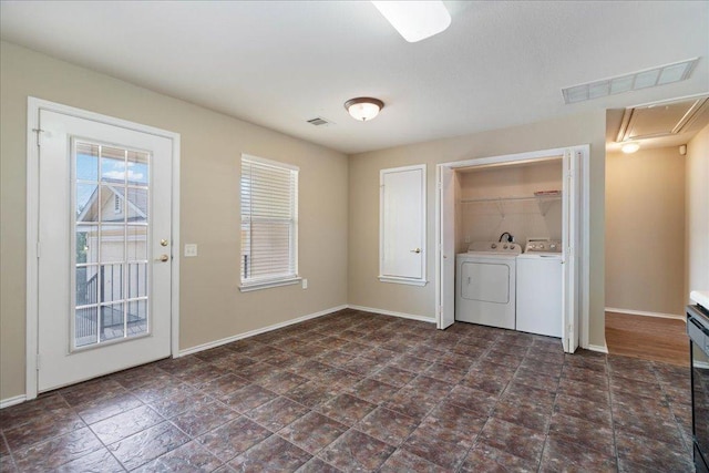 11617 Briarcreek Loop, Manor, TX 78653 - laundry room featuring washing machine and clothes dryer and attic access