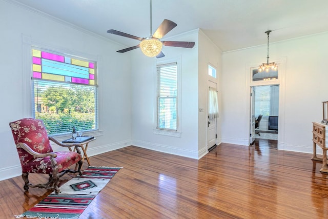 618 N Penelope St, Belton, TX 76513 - entrance foyer featuring crown molding, wood finished floors, and ceiling fan