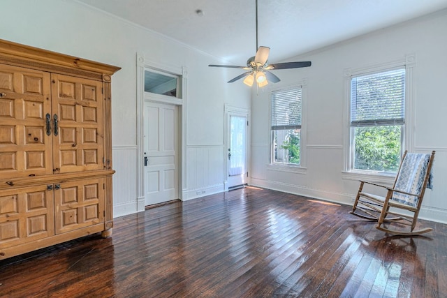 618 N Penelope St, Belton, TX 76513 - entrance foyer featuring hardwood / wood-style floors, a ceiling fan, a decorative wall, ornamental molding, and wainscoting