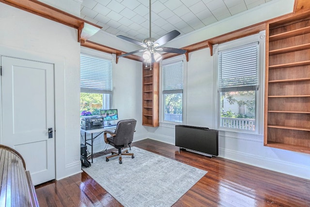 618 N Penelope St, Belton, TX 76513 - home office with built in features, a ceiling fan, and dark wood-style floors