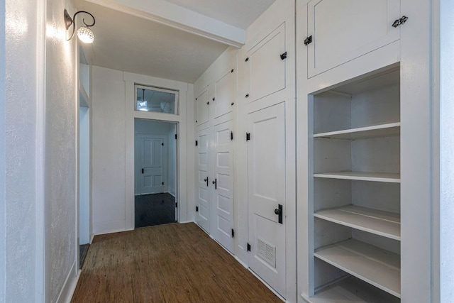 618 N Penelope St, Belton, TX 76513 - hall featuring dark wood-style flooring and baseboards