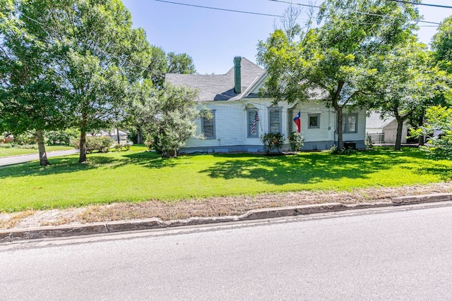 618 N Penelope St, Belton, TX 76513 - view of front of house featuring a front lawn